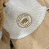 Casquette velours Cocooning sherpa avec cache-oreilles zoom sur le logo Casquette velours Cocooning sherpa avec cache-oreilles zoom sur le logo