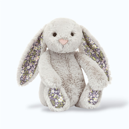 Lapin gris à motif fleuri dans les oreilles Lapin gris à motif fleuri dans les oreilles