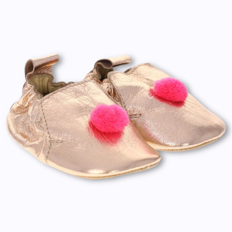 Chaussons bébé pompon rose fluo Le Petit Souk en cuir souple